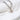 heart shape chain link bracelts on white cloth
