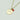 On a white background, there is a necklace with a single stone.
